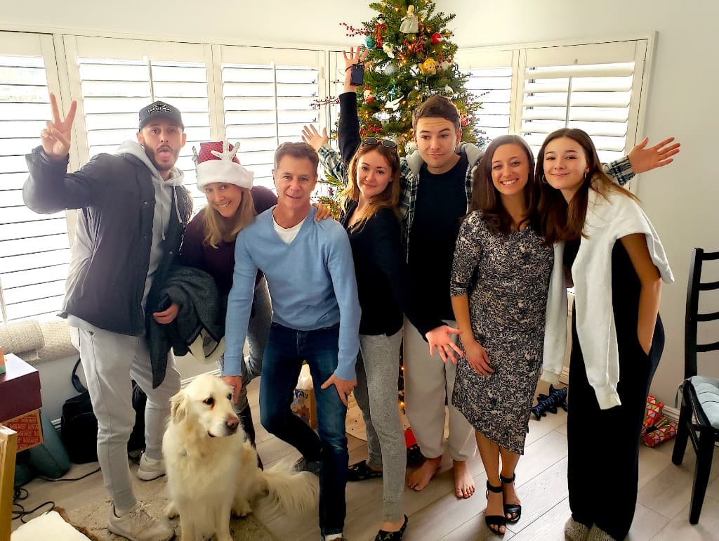 Paul Lauer with his wife Laura, their five children, and their dog Duke